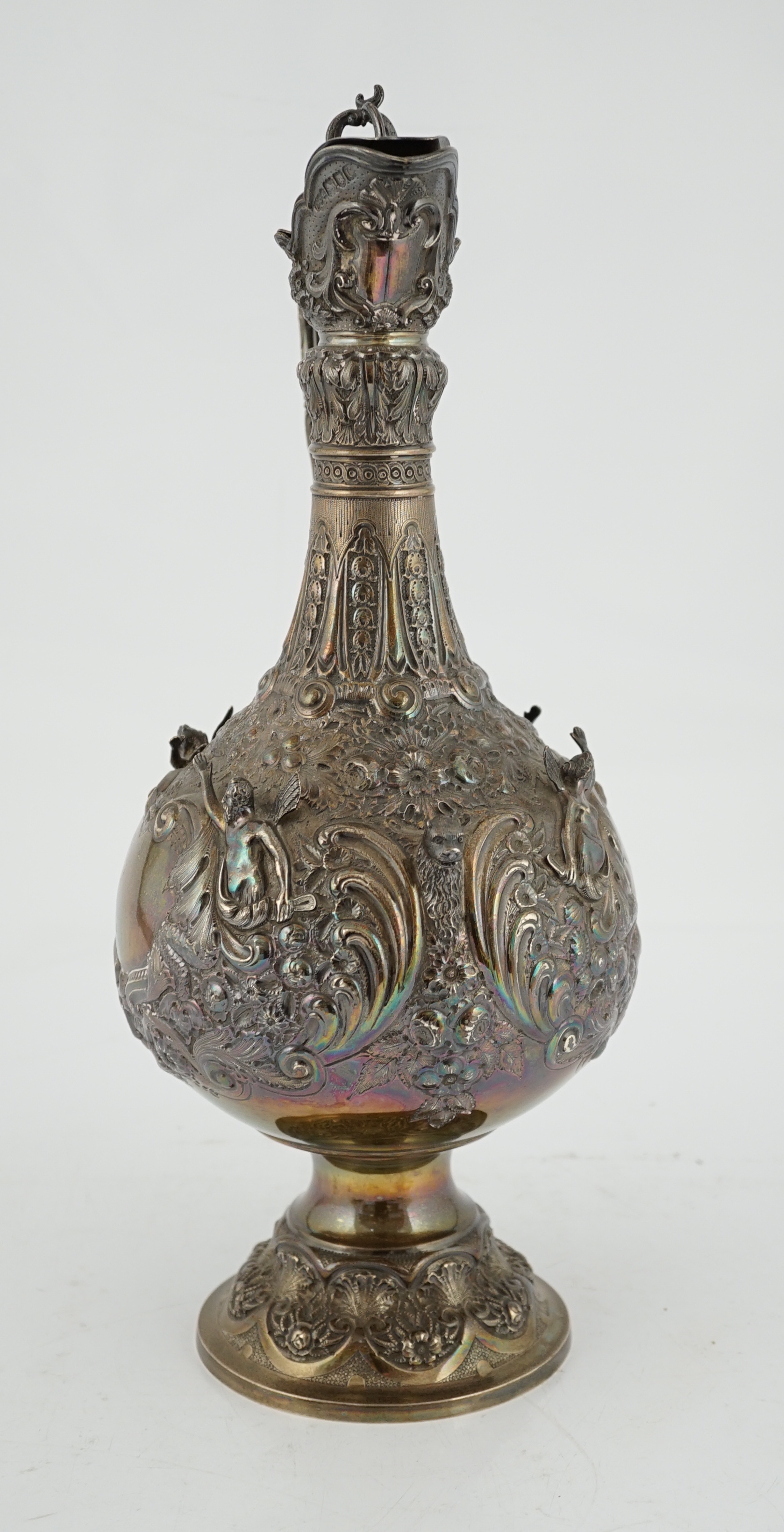 An ornate Victorian silver hot water jug, by Elkington & Co, CITES Submission reference UF9517NZ